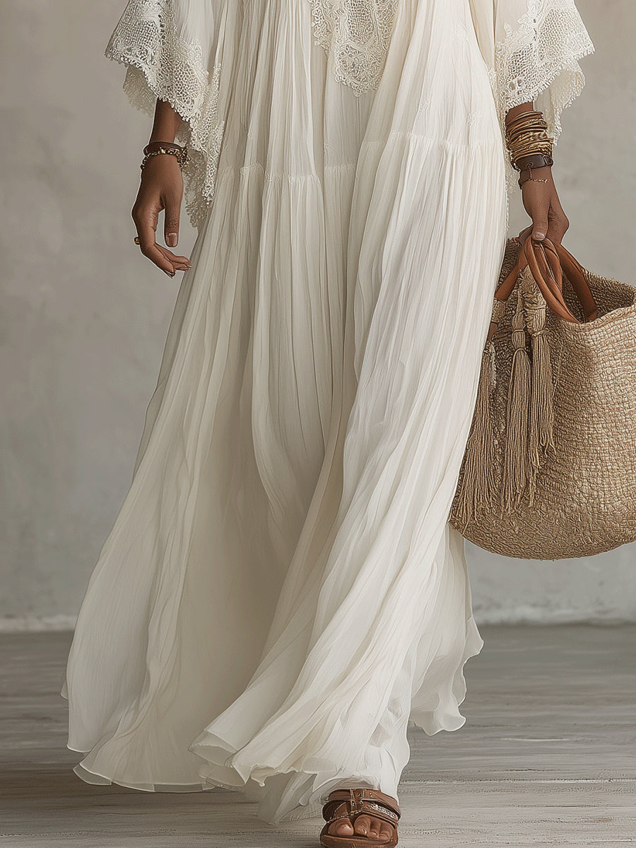 Vestito maxi in pizzo bianco con scollo a V e maniche a pipistrello in chiffon