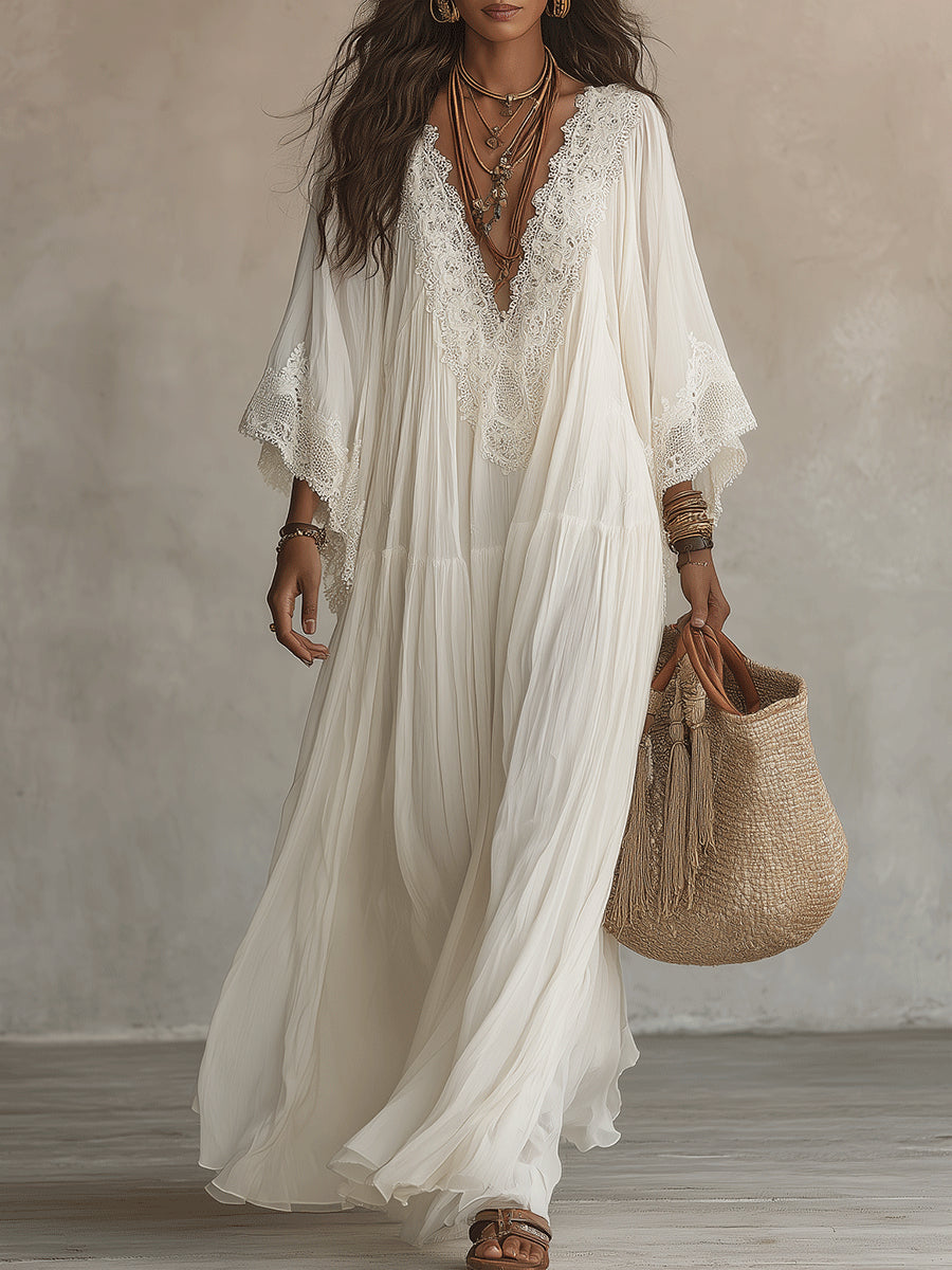 Vestito maxi in pizzo bianco con scollo a V e maniche a pipistrello in chiffon
