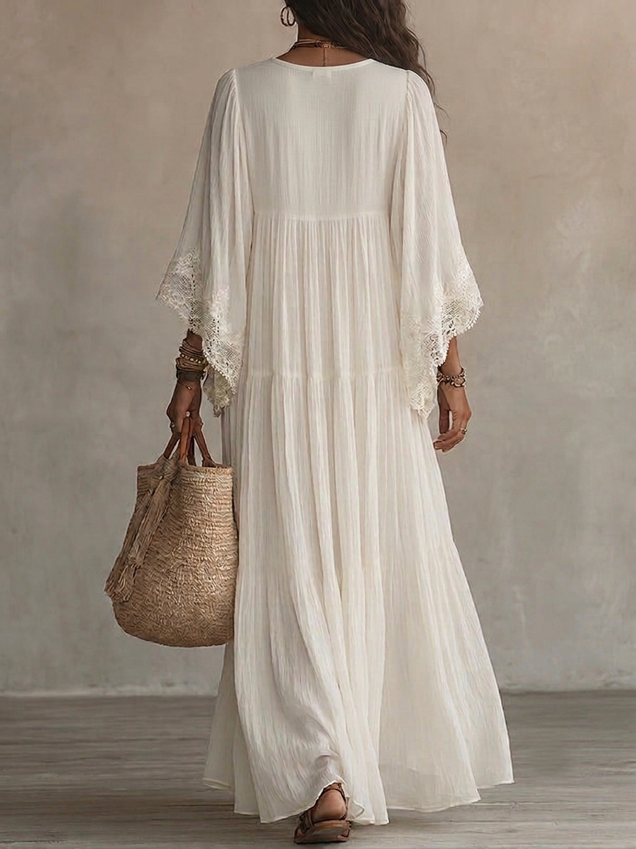 Vestito maxi in pizzo bianco con scollo a V e maniche a pipistrello in chiffon