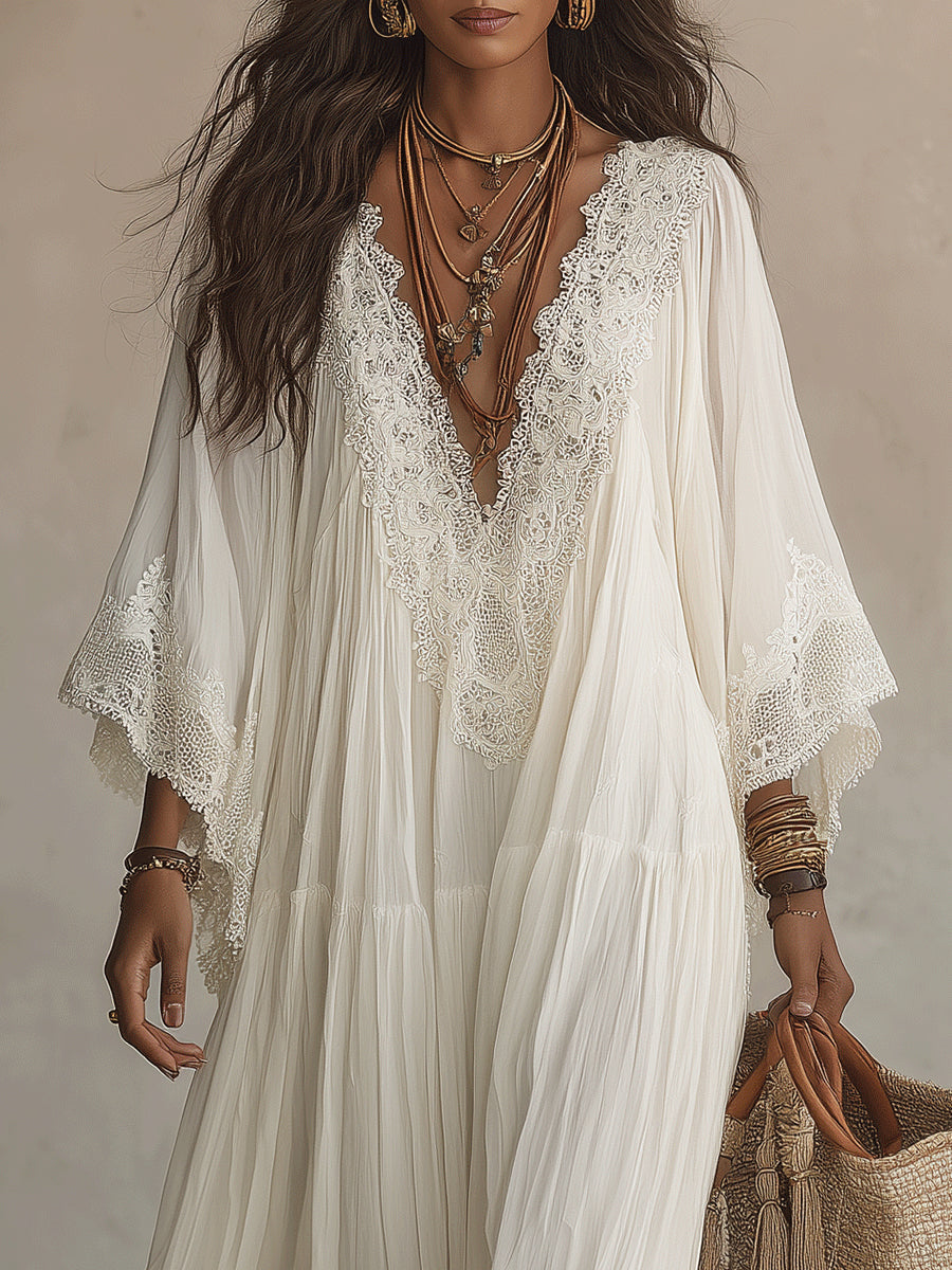 Vestito maxi in pizzo bianco con scollo a V e maniche a pipistrello in chiffon