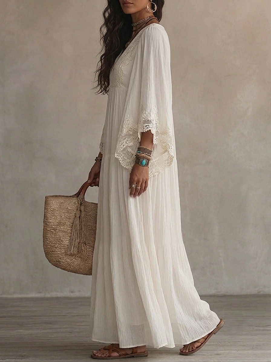 Vestito maxi in pizzo bianco con scollo a V e maniche a pipistrello in chiffon